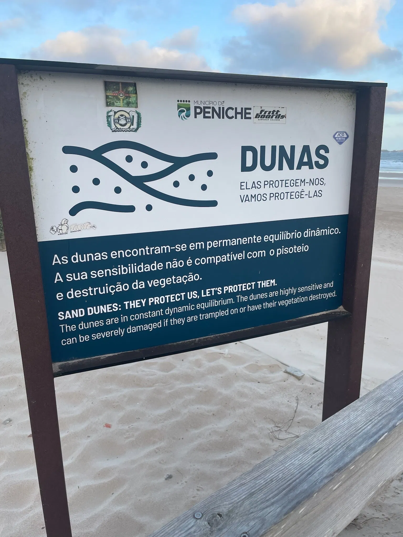 Protective coastal sand dunes in Portugal with elevated wooden walkway